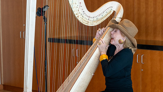 NWS’s new harp unites donor, alumni, Fellows and audience